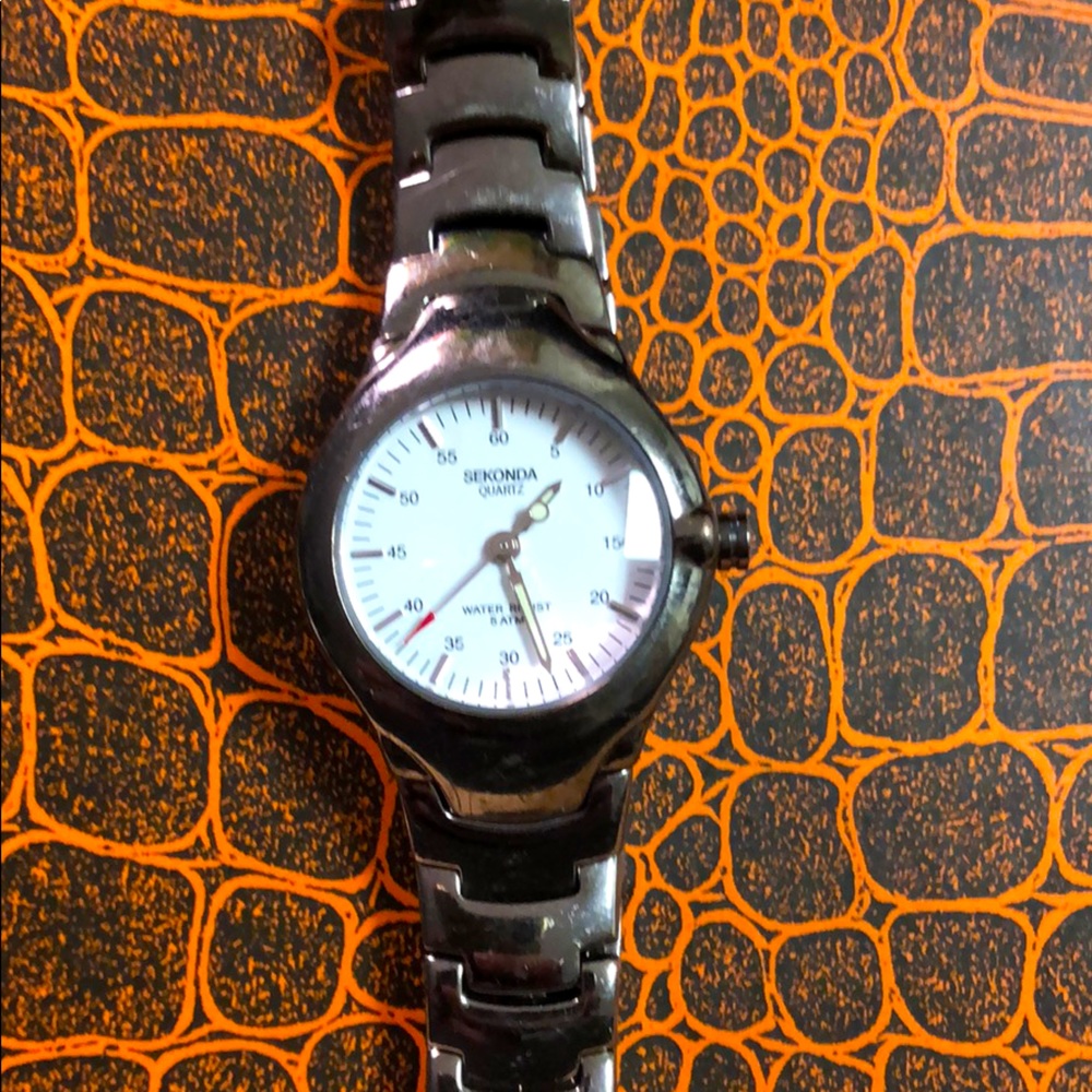 Sekonda women’s small face heavy titanium watch